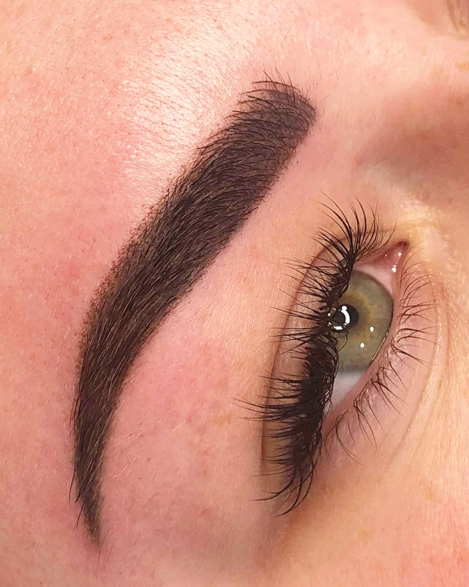A close-up of finished brow and lash work at The Little Beauty Clinic